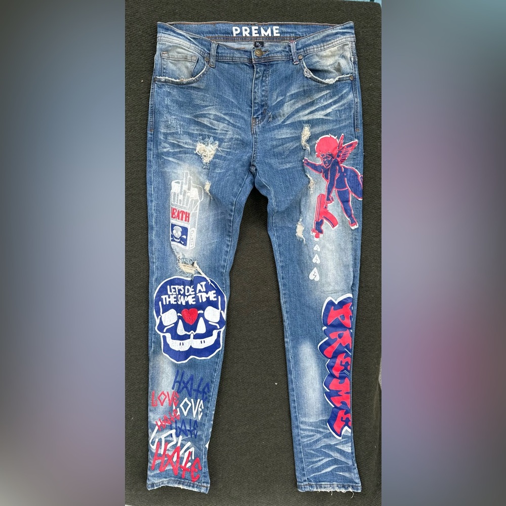 Preme Blue Graphic Skinny Jeans Size 38/34. Distressed Whiskered Cupid Love Hate